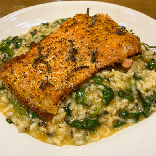 creamy spinach risotto with bruschetta butter and steelhead trout