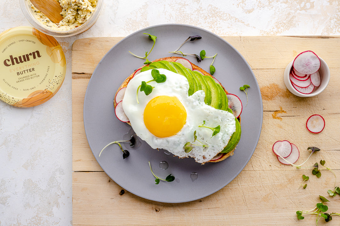 Avocado Toast with a Fried Egg, Red Radish, and Churn Everything Butter