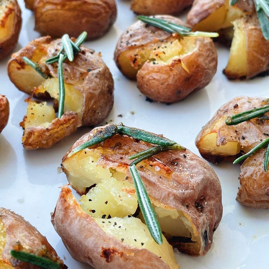 Rosemary Smashed Potatoes with Churn Garlic & Shallot butter